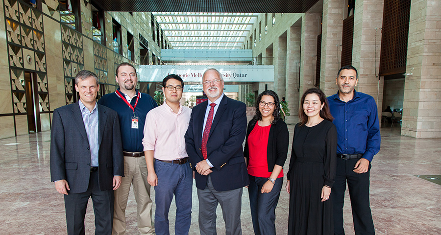 Dean Michael Trick and new faculty members