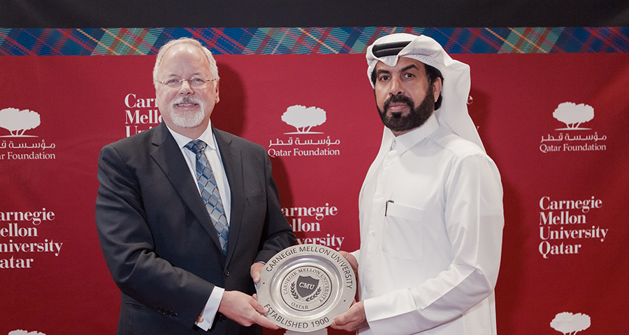 Qatar Stock Exchange's Rashid Al Mansoori with Dean Trick