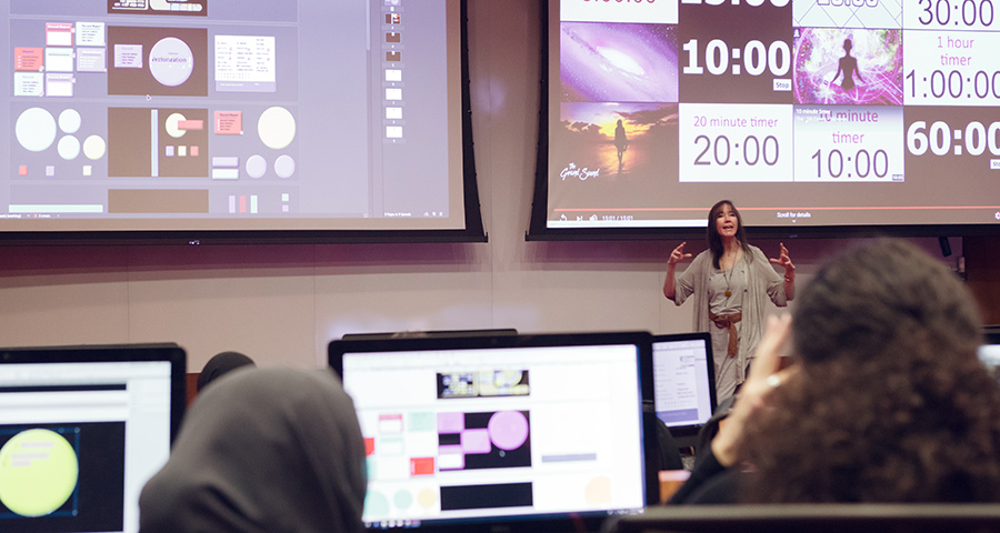 Professor Susan Hagan teaches students about Information Systems at Experience CMU-Q