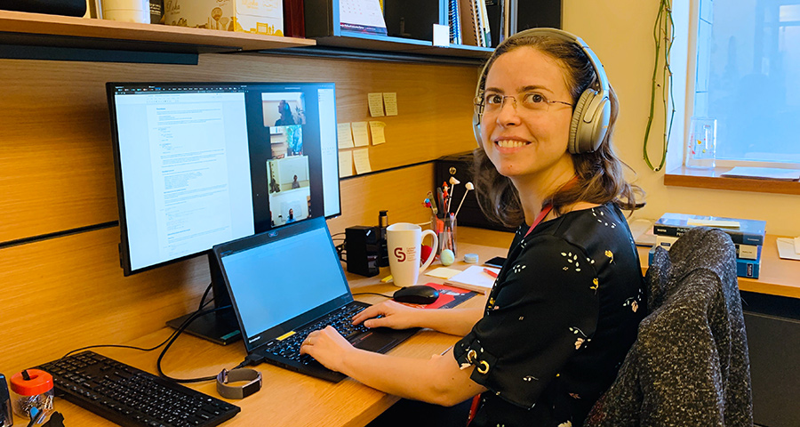 Giselle Reis, assistant teaching professor of computer science, teaching remotely from the building in the first few days