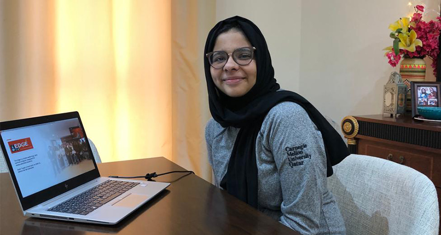 Reem Muhammad Hashir, who has been admitted into the Information Systems Program at CMU-Q, watches the online Marhaba Tartans welcome event.