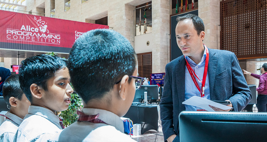 Students showcase their programming work at the Alice Programming Competition.