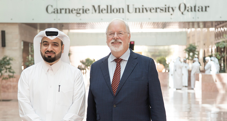 Mr. Faisal Mohamed Al-Emadi, Acting Secretary-General of the Qatar Red Crescent, and Dr. Michael Trick, the Dean of CMU-Q