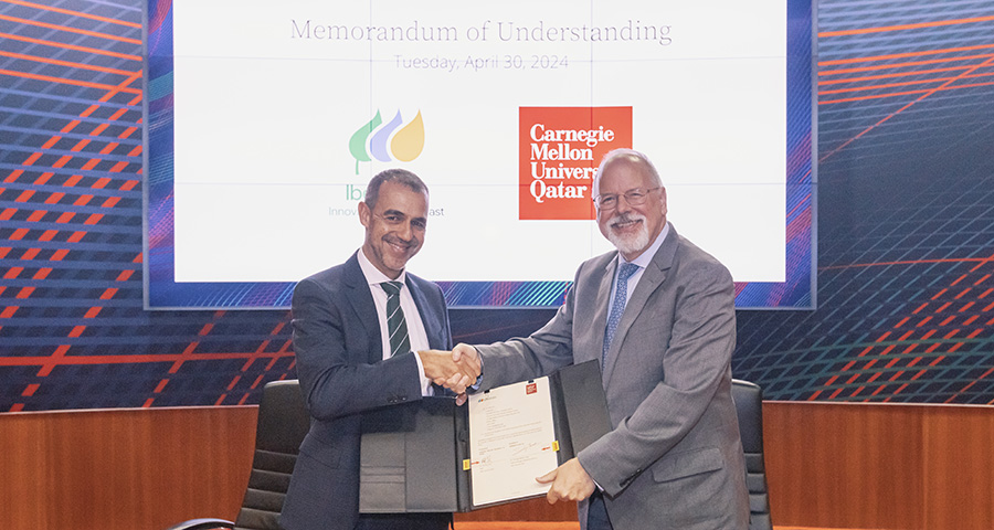 Michael Trick, dean of CMU-Q, and Santiago Bañales Lopez, managing director of Iberdrola Innovation Middle East