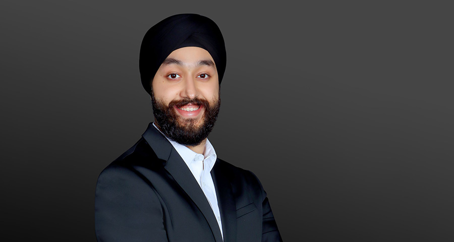 Professional headshot of Sanjeet Sahni