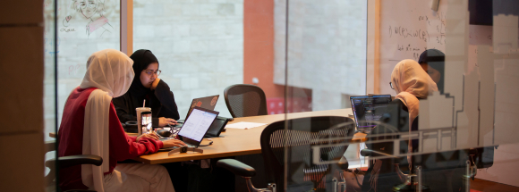 Group of students in a study room.