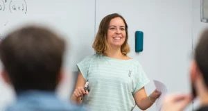 CMU-Q-CS-Faculty-Giselle-Reis-in-classroom