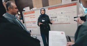 CMU-Q student presenting research at Meeting of the Minds 2026