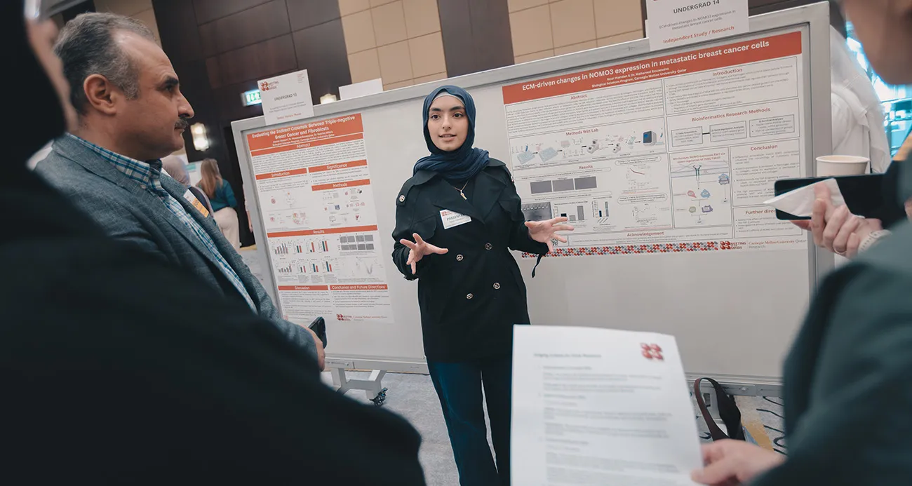 CMU-Q student presenting research at Meeting of the Minds 2026