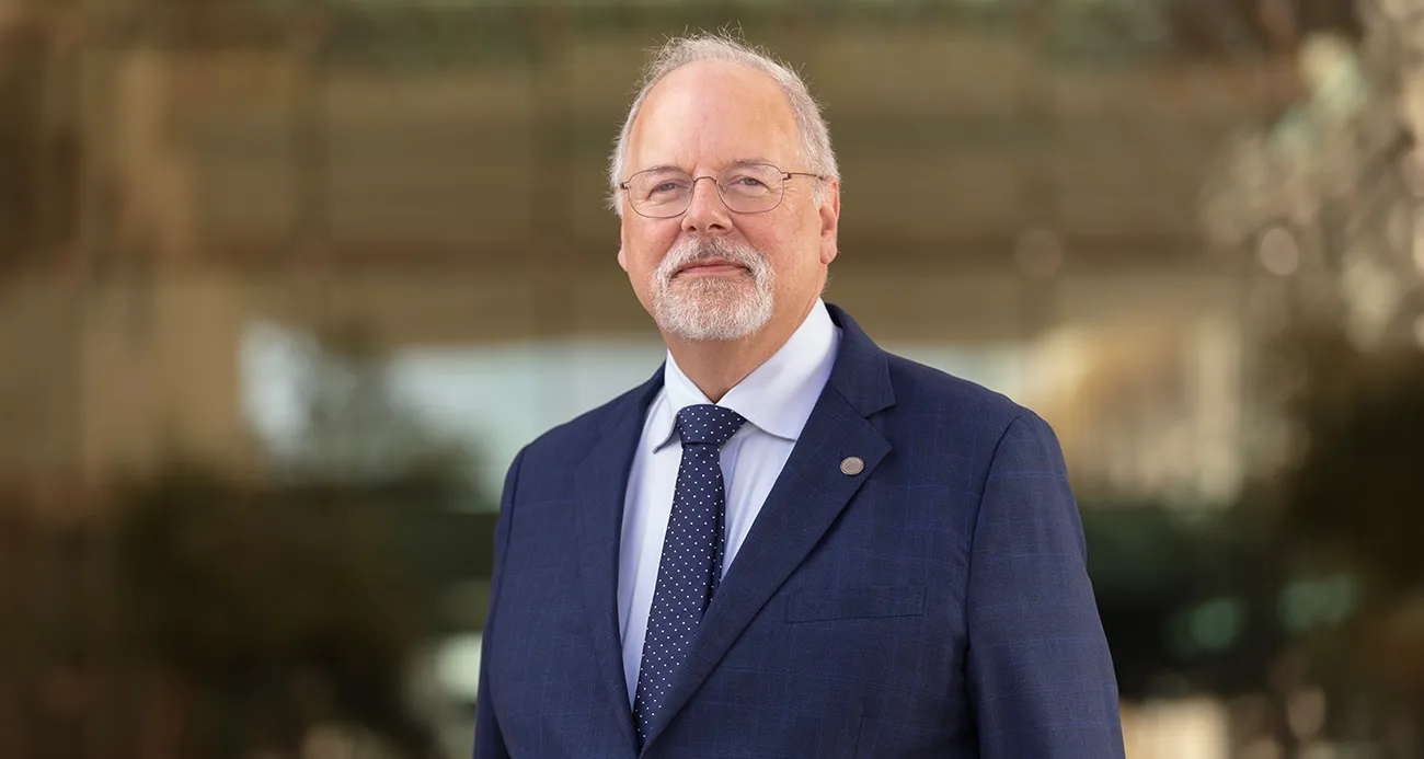 CMU-Q, Dr. Michael Trick