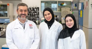 Ihab Younis with Mariam Elesnawy and Hana Hasna, two of the alumni co-authors