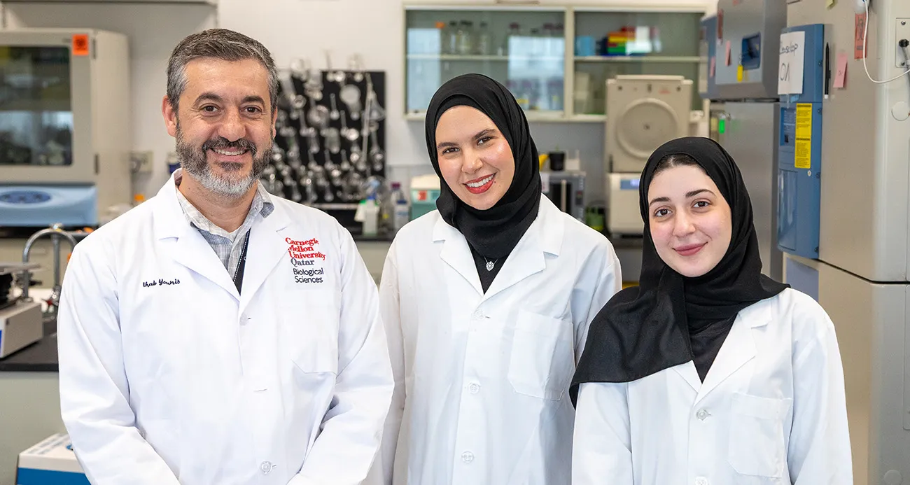 Ihab Younis with Mariam Elesnawy and Hana Hasna, two of the alumni co-authors